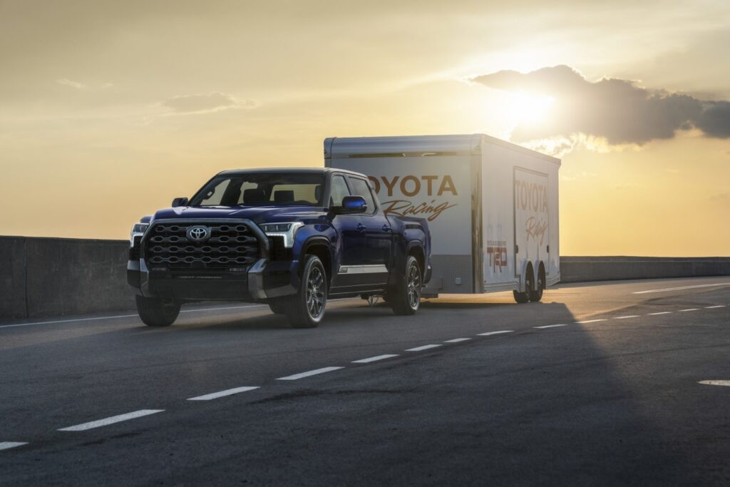 Toyota Tundra towing a trailer at sunset