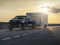 Toyota Tundra towing a trailer at sunset