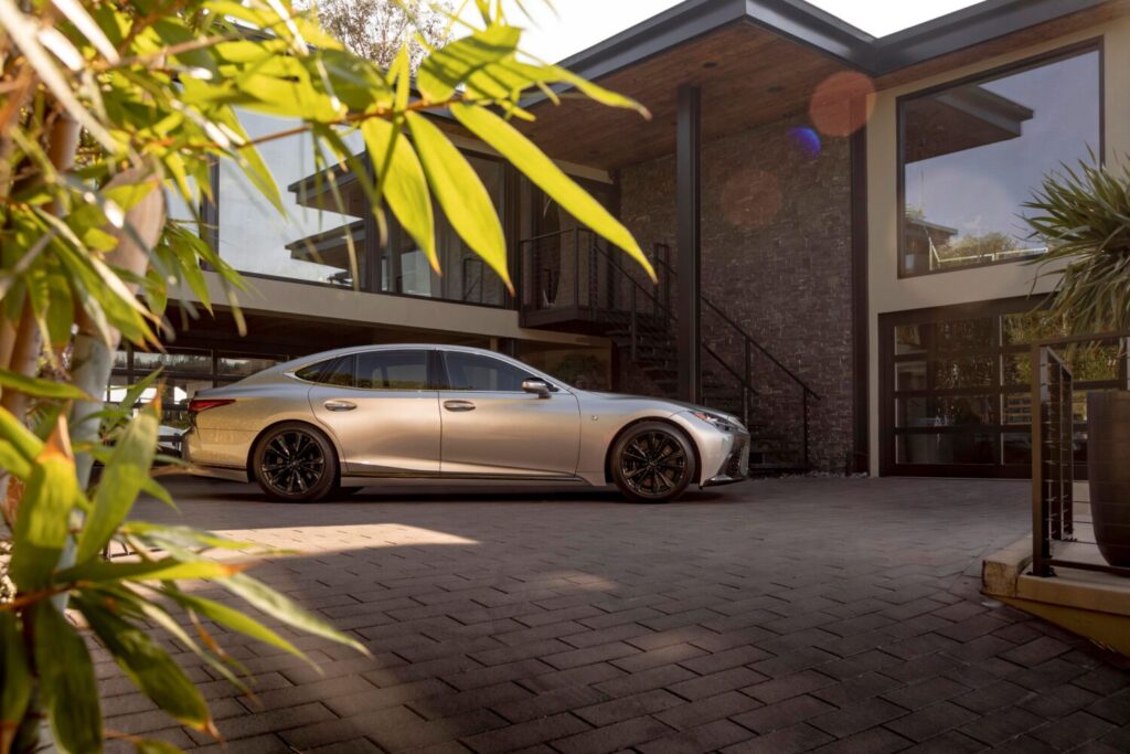2025 Lexus LS 500 parked outside a modern house
