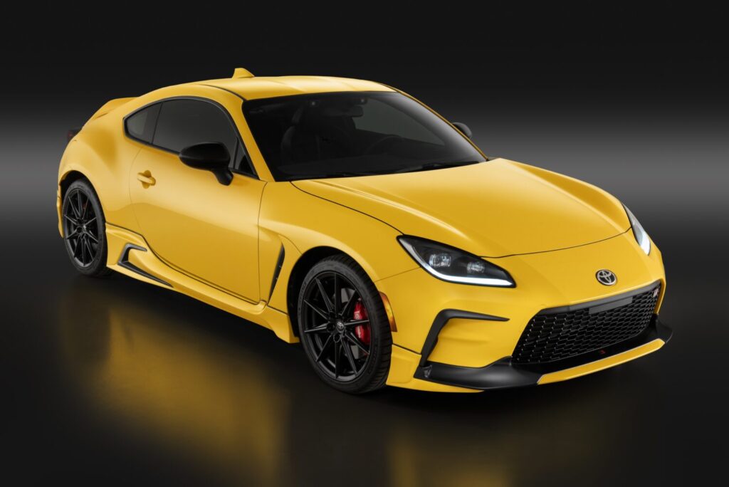 2026 Toyota GR86 Yuzu Edition in yellow, front three-quarter view