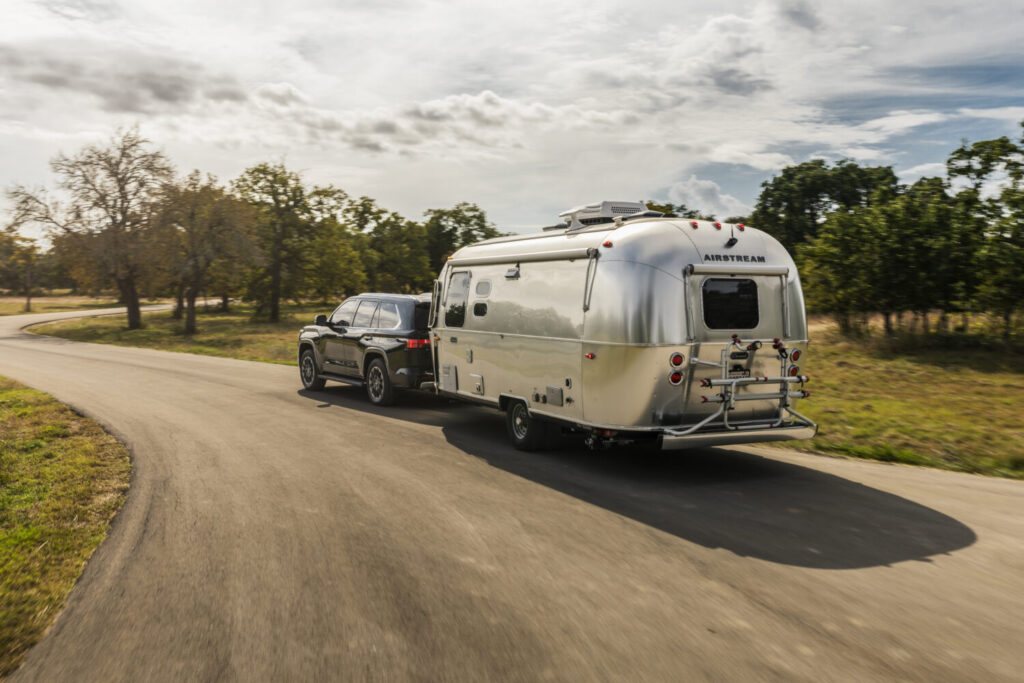 Toyota Sequoia Limited towing on a rural road