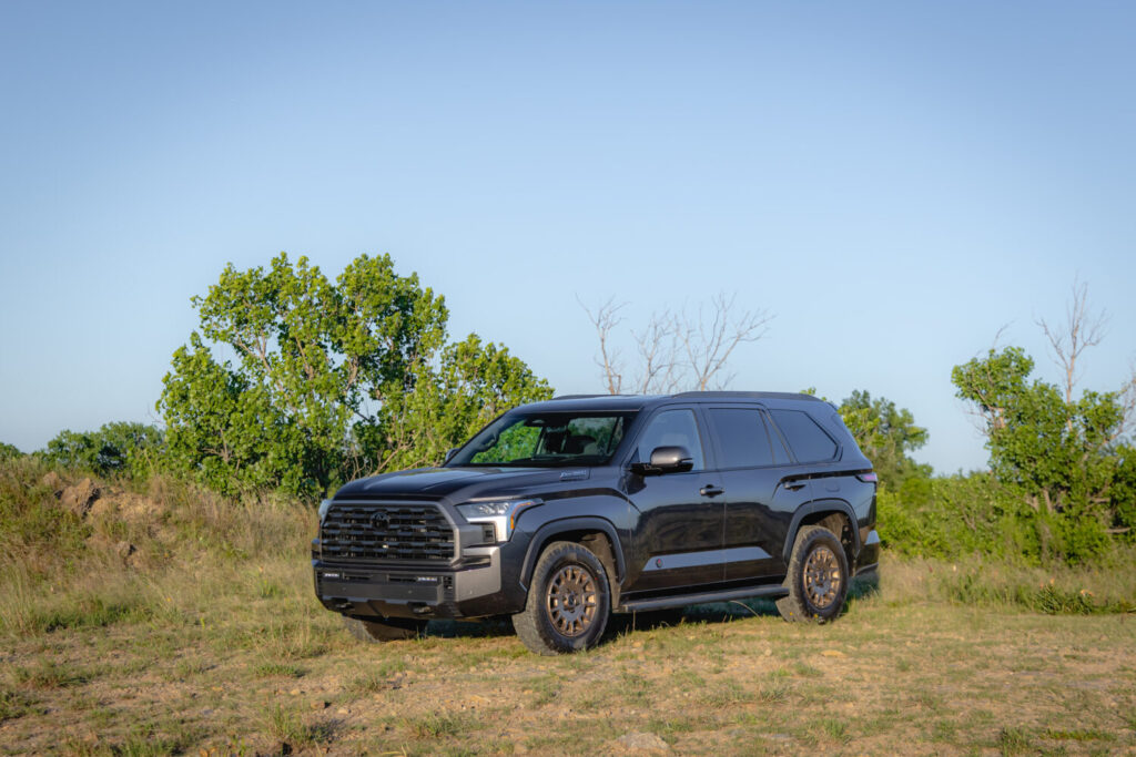 2027 Toyota Sequoia Trailhunter in a field