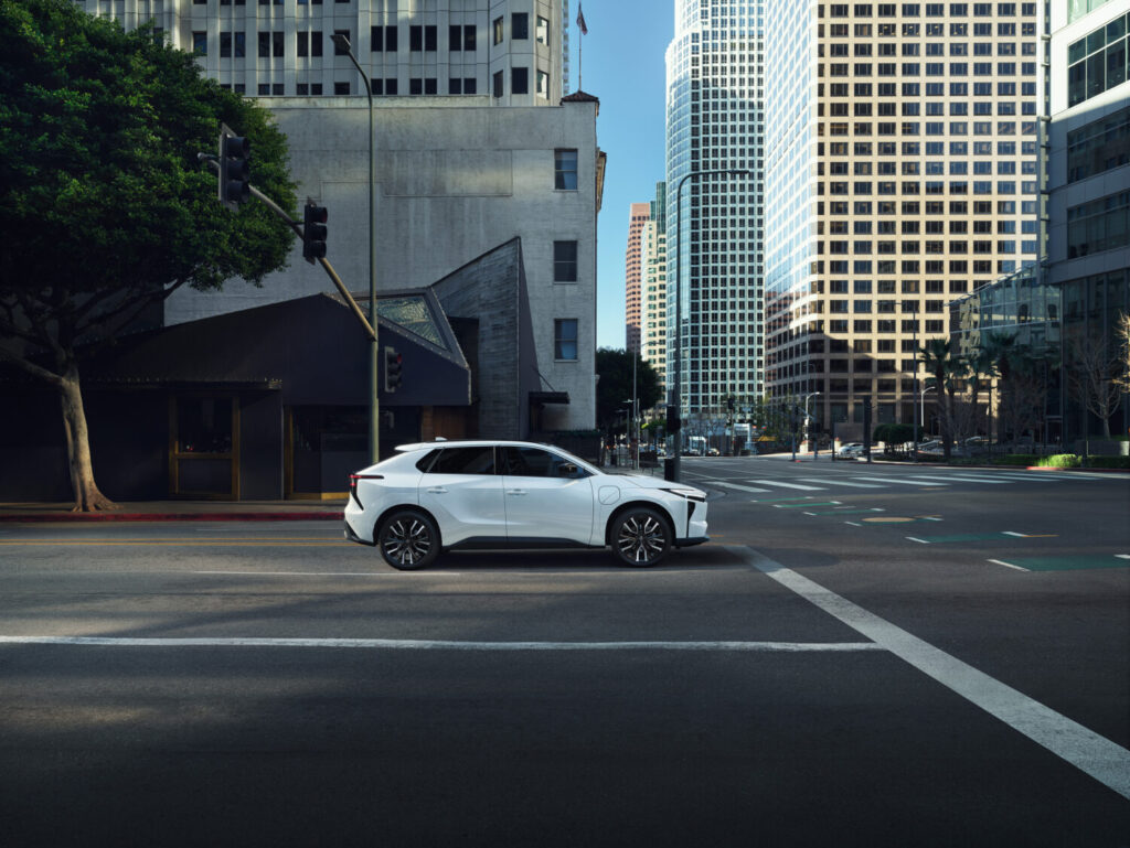 2026 Toyota bZ in white parked on a downtown street