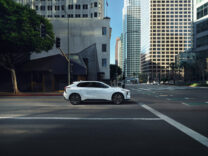 2026 Toyota bZ in white parked on a downtown street